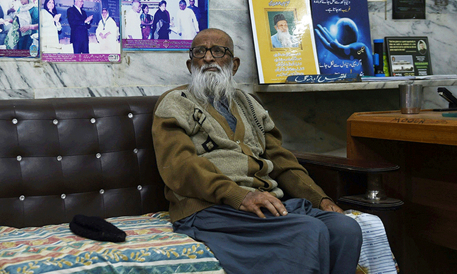 Abdul Sattar Edhi sits in his office in Karachi