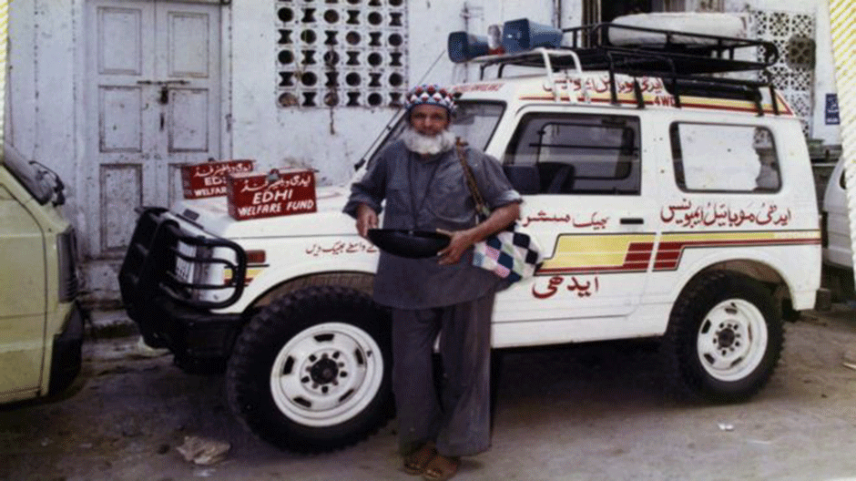 Abdul Sattar Edhi with his Car which he converted into Ambulance